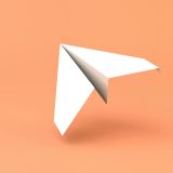 A paper plane against an orange background