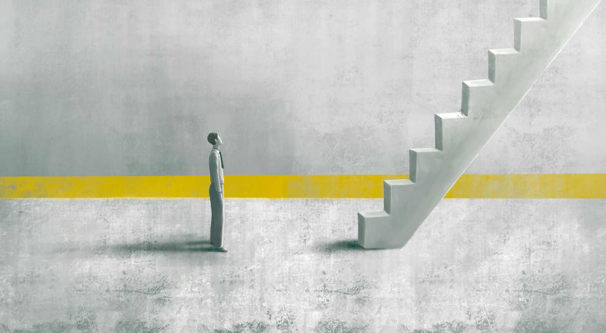 A lone figure at the foot of a staircase